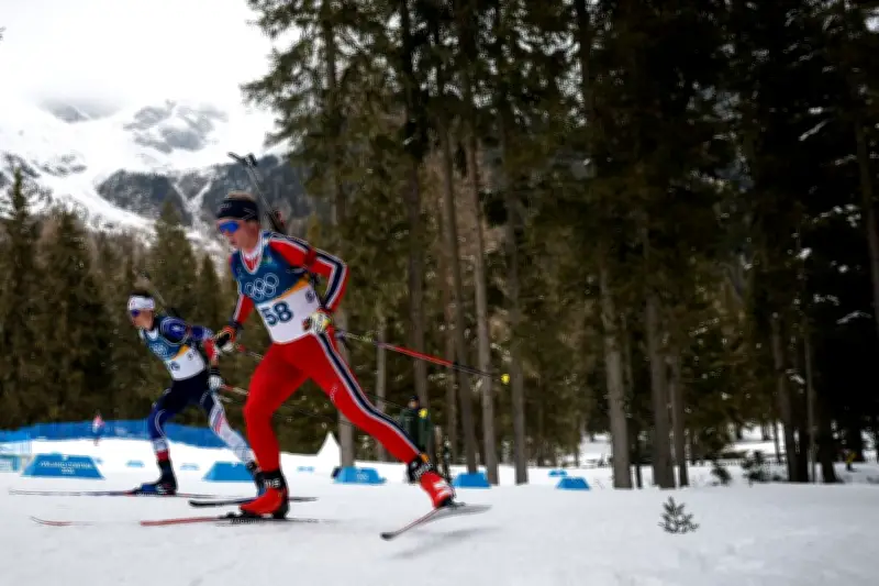 Biathlon JO 2026 : Éric Perrot en argent, le Norvégien Johan Olav Botn en or