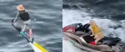 Un homme en jet pack promène son golden retriever en jet-ski en Floride