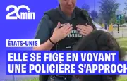 Une fillette de 4 ans lève les mains devant une policière après la mort de George Floyd