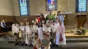 Première communion de 14 enfants à Saint-Chély-d'Apcher