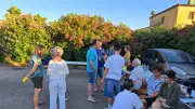 Repas des Coquelicots : convivialité malgré la chaleur et le match